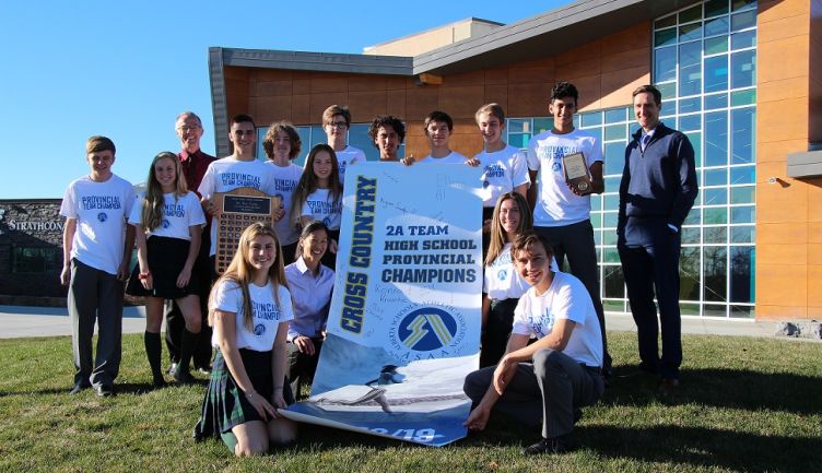 Spartans Defend ASAA 2A Cross-Country Running Banner and 2A Zone Banner 