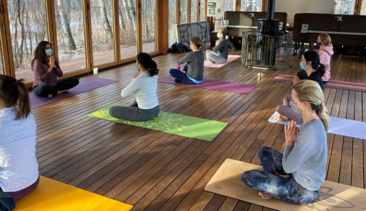 Yoga in the Aspen Lodge for STS's 50th Anniversary