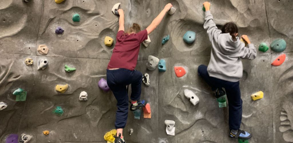 Students are Cranking, Crimping, and Throwing on STS's New Climbing Boulder 