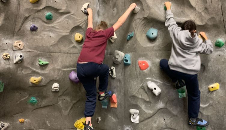 Students are Cranking, Crimping, and Throwing on STS's New Climbing Boulder 